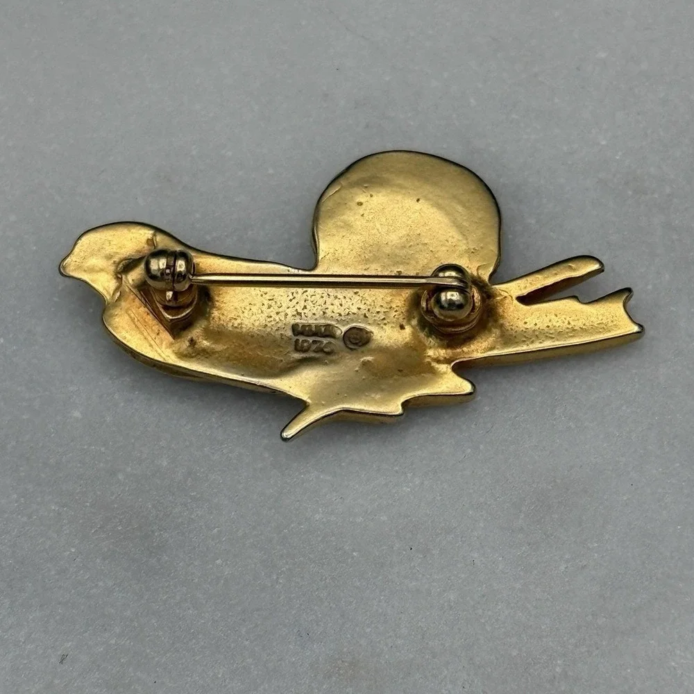 Mma bird brooch